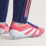 Predator Elite con lengüeta plegable Coral Blaze